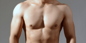 grasa pectorales hombres